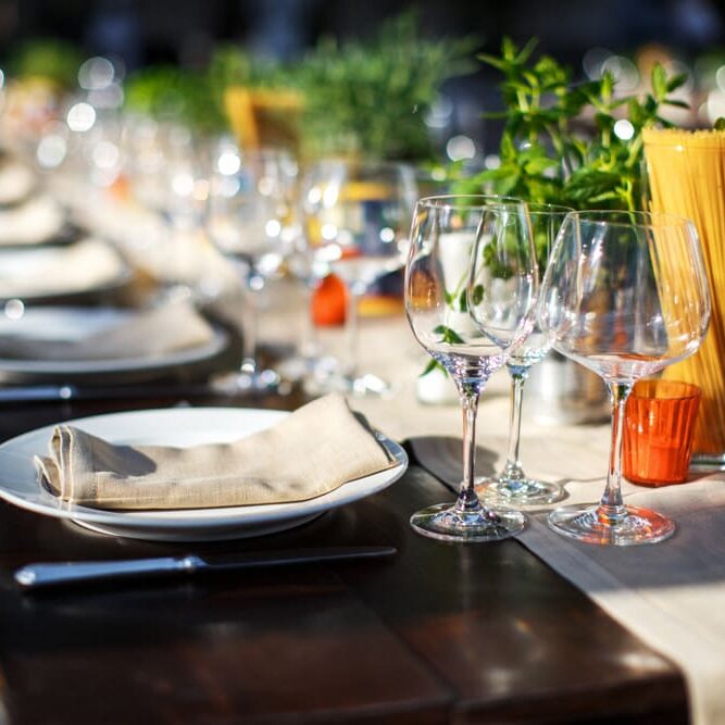 Elegant table setting with wine glasses