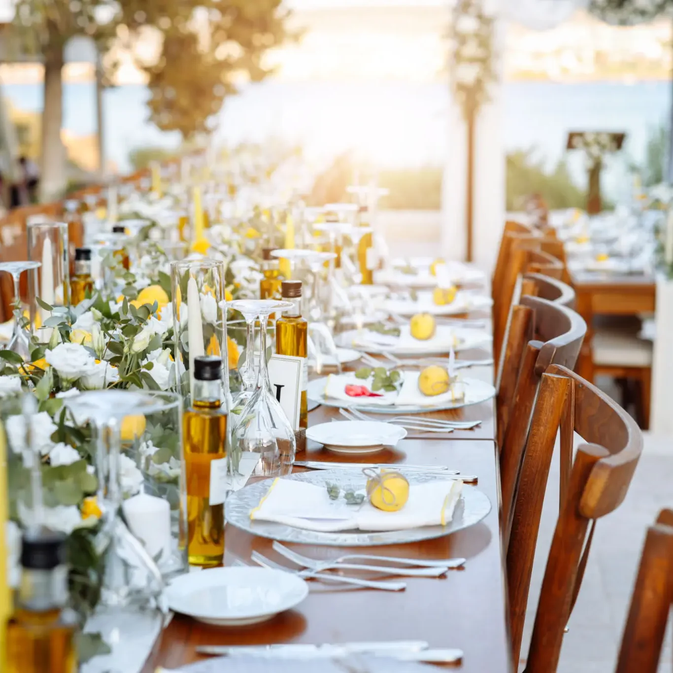 Outdoor lakeside wedding reception table setting